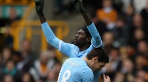 Emmanuel Adebayor celebrating goal against Wolves
